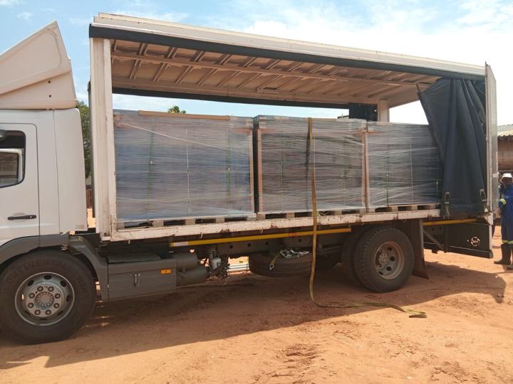 Curtain-side truck loaded with stock